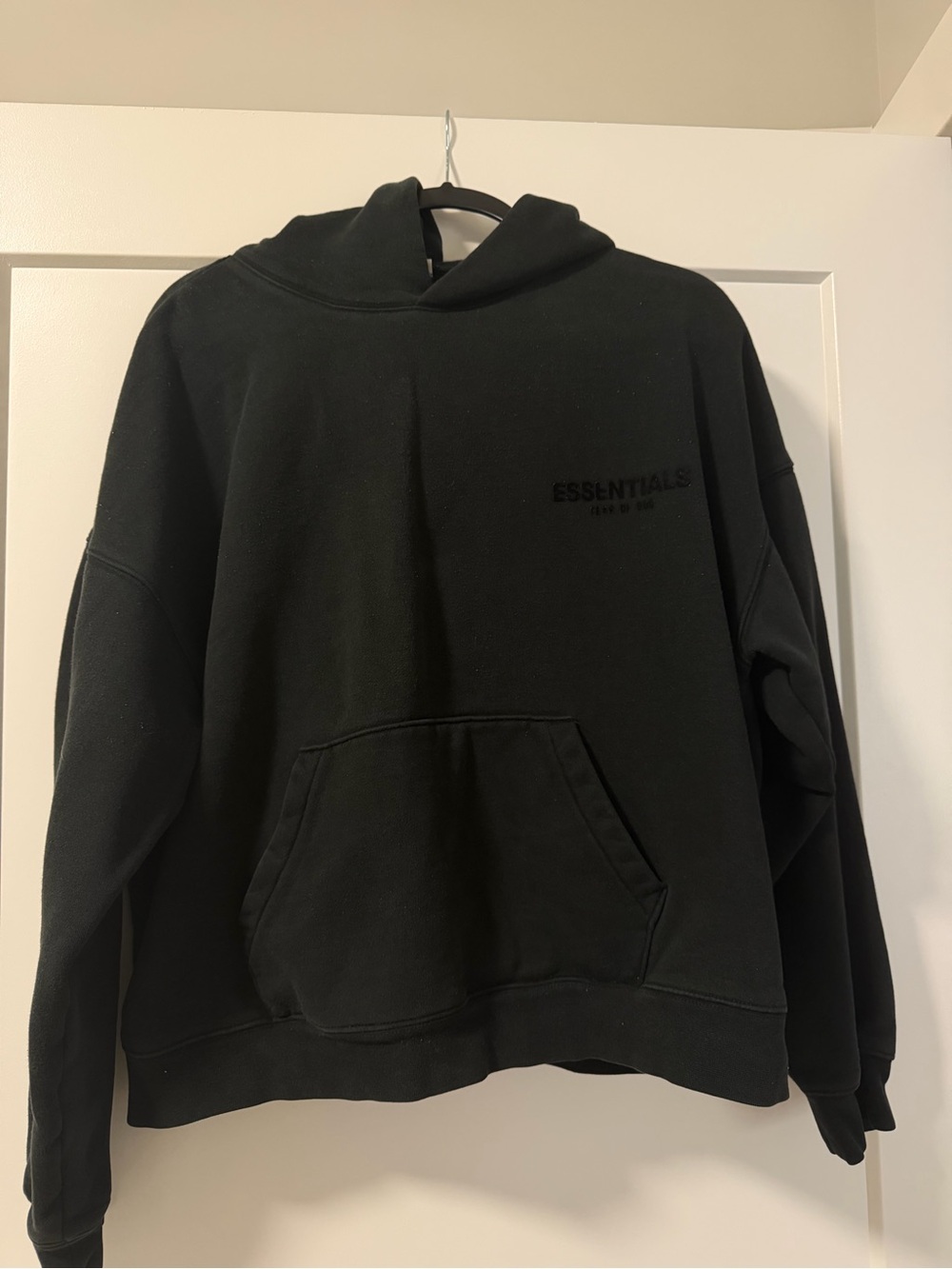 Essentials Black Pullover Hoodie with Subtle Logo